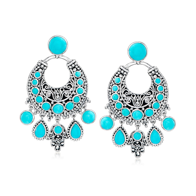 Hamsa charm drop earrings in sterling silver with turquoise cabochon stones and hoop drops