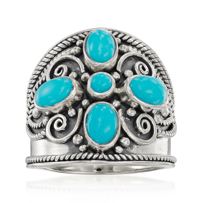 Turquoise cabochon sterling silver ring with ornate scrollwork and five oval stones