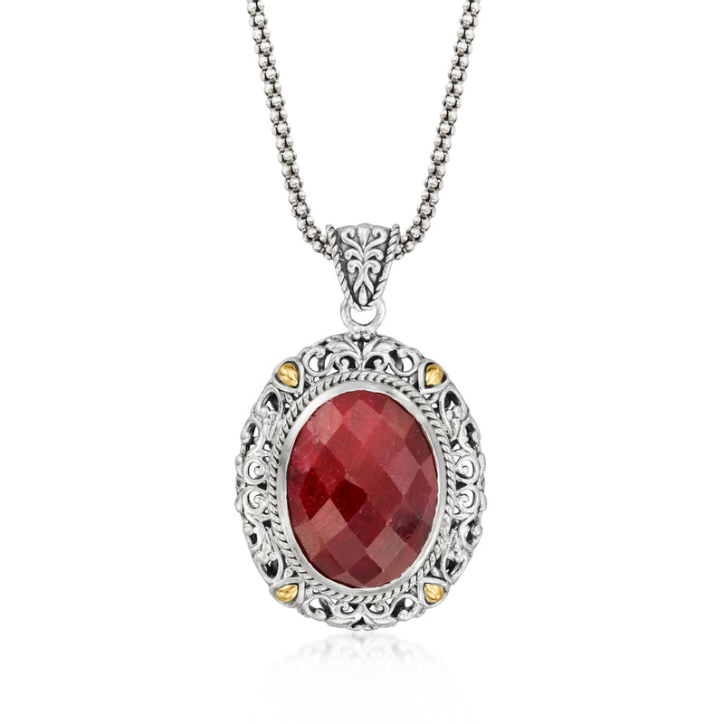 Sterling silver pendant necklace with oval ruby red gemstone and yellow gold accents