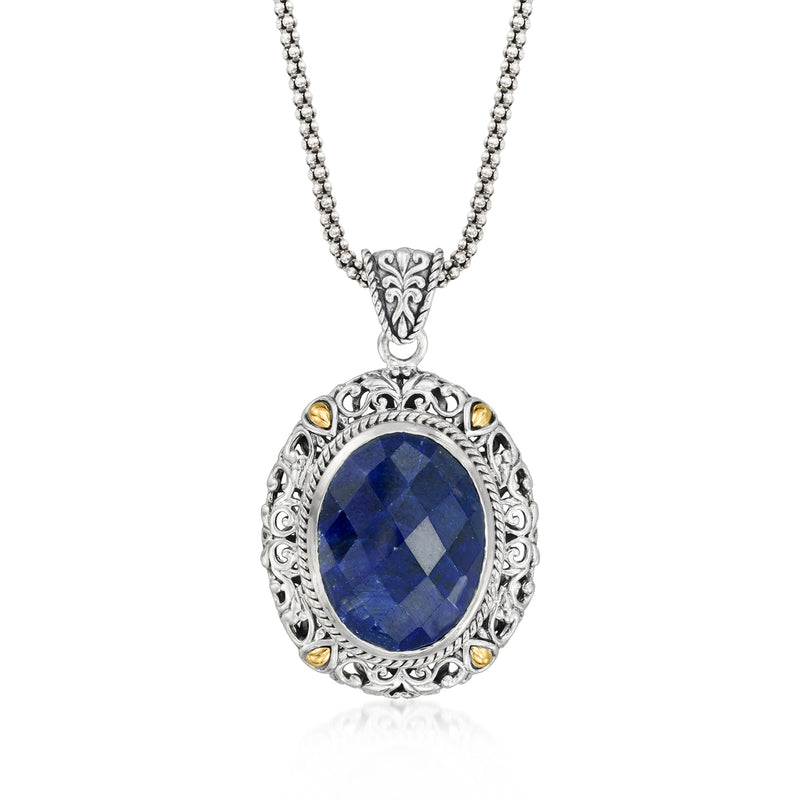 Sterling silver Bali-style pendant necklace with oval blue gemstone and gold accents