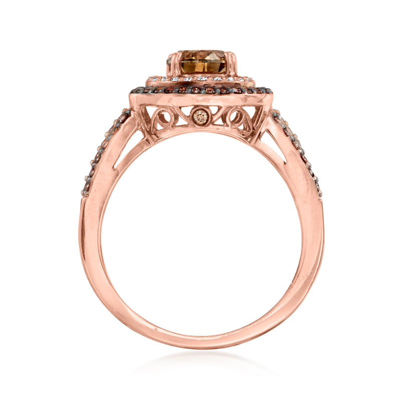 Rose gold diamond ring with open circular band and halo set brown center stone