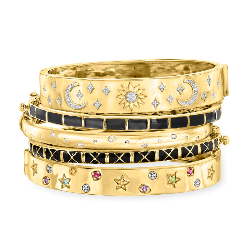 Set of five gold-tone bangle bracelets with star, moon, sun charms and multicolor stones