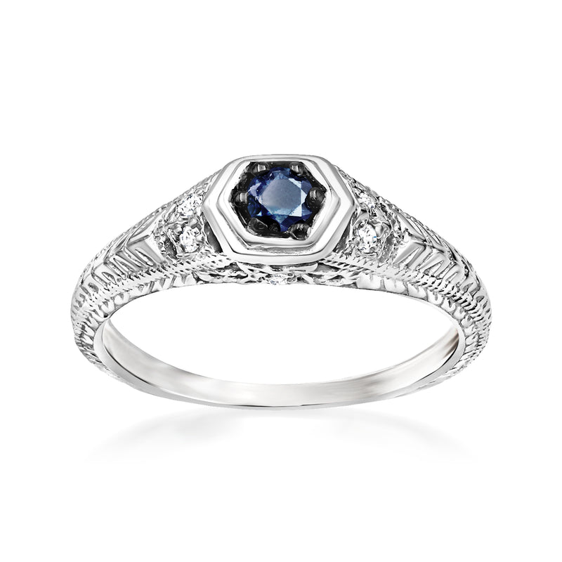 Sterling silver blue diamond ring with white diamond halo and textured shoulders