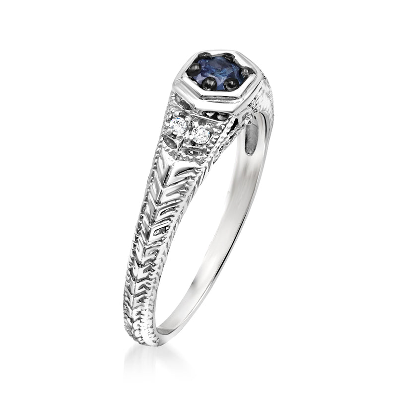 Sterling silver blue diamond ring with prong-set center and ornate side diamond accents