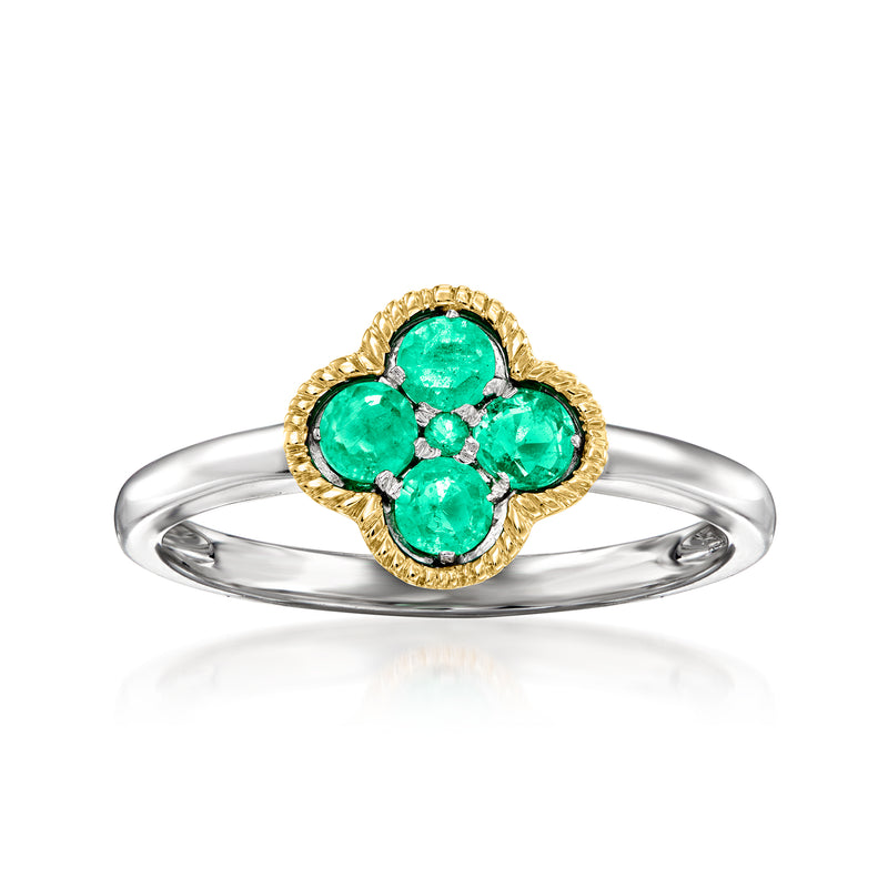 Emerald floral cluster ring with green gemstones, yellow gold halo, and sterling silver band