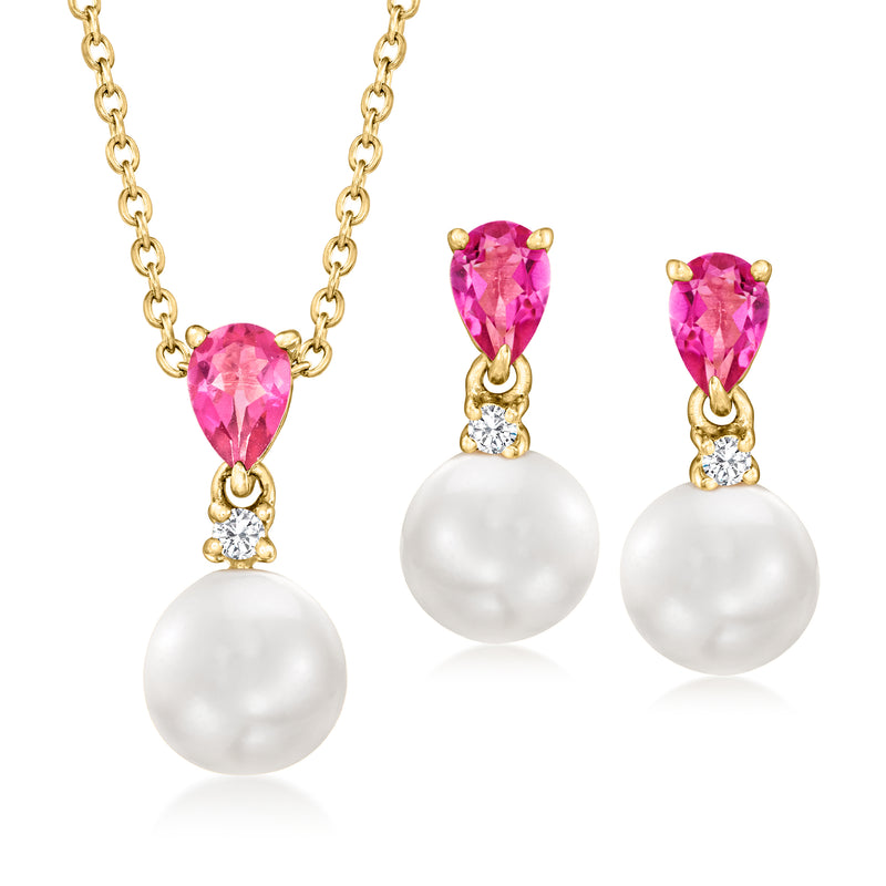 Gold jewelry set with pink gemstone drops, white cultured pearls, and small clear stones