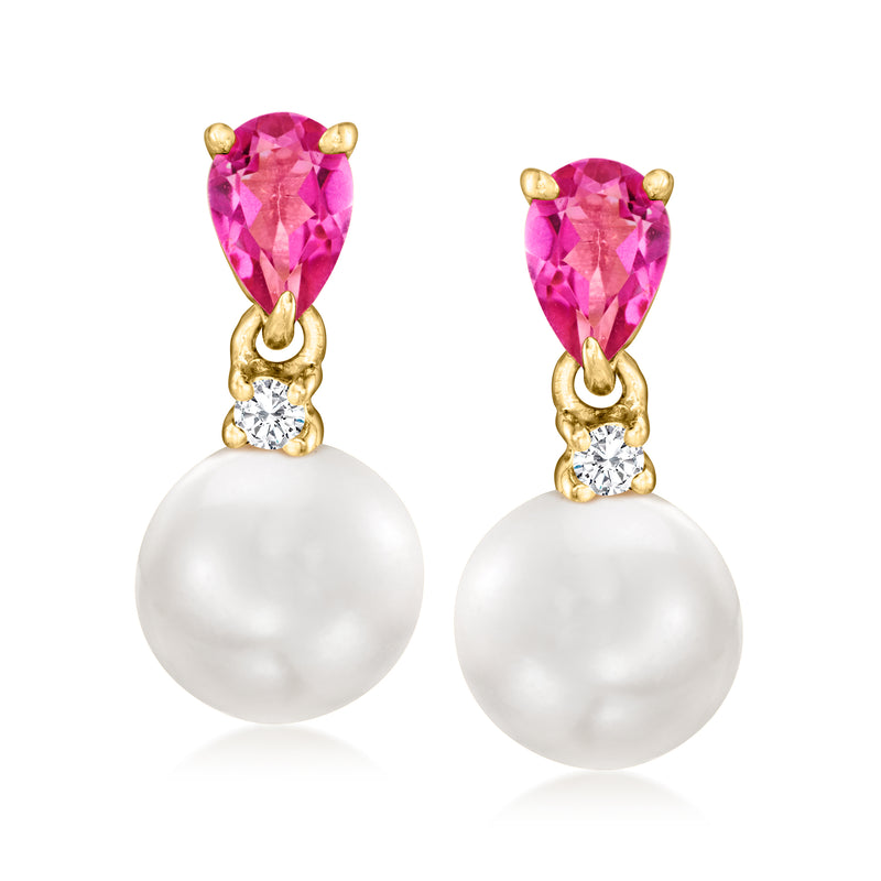 Gold drop earrings with pink teardrop stones, white cultured pearls, and clear halo accents