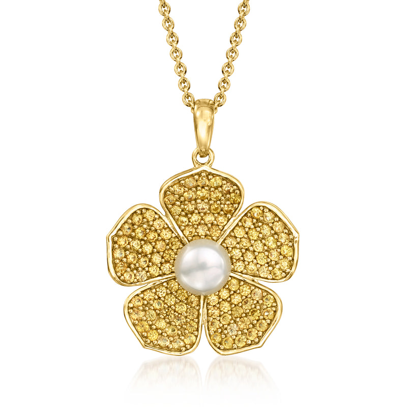 Gold pendant necklace with flower design: white cultured pearl center, yellow pave petals