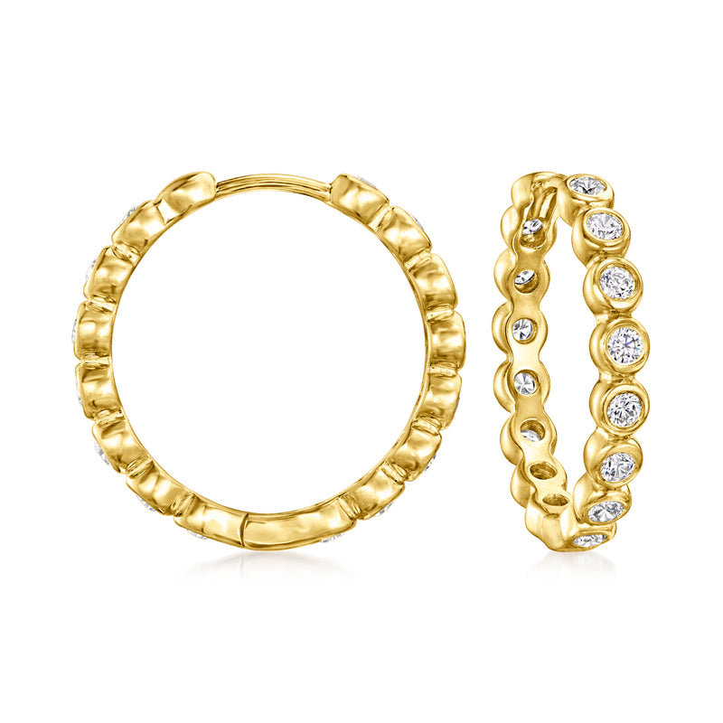 Gold hoop earrings with round bezel-set CZ stones, 18kt gold over sterling.