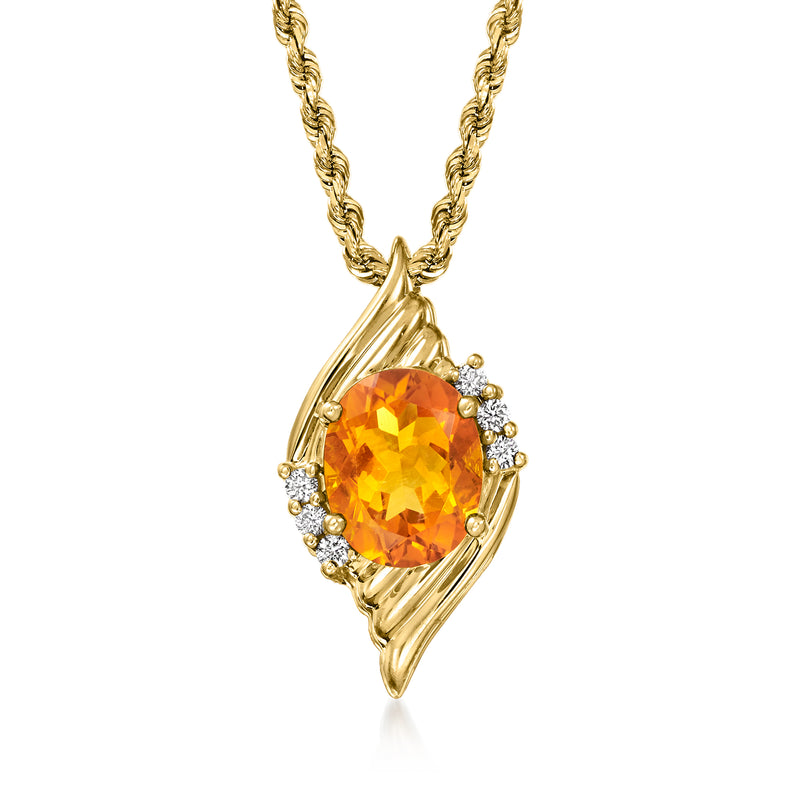 Oval citrine pendant necklace with diamond halo in 14kt yellow gold.