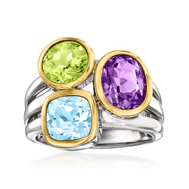 Two-tone sterling silver gemstone ring with blue topaz, amethyst, and peridot ovals