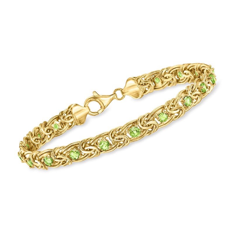 Gold Byzantine bracelet with oval green peridot-like stones in link setting