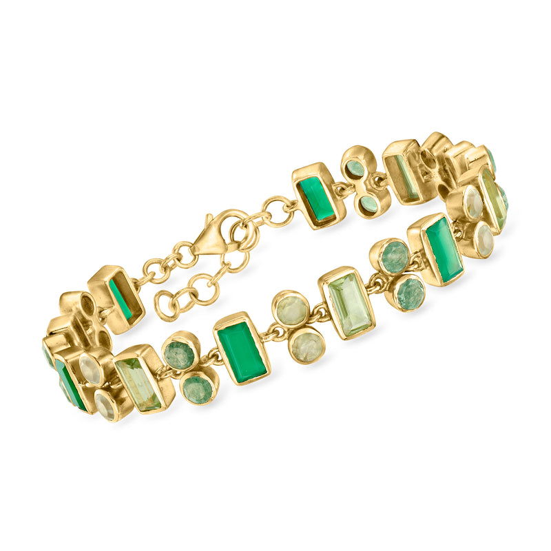Gold-tone bracelet with green square and round gemstones, linked chain and clasp