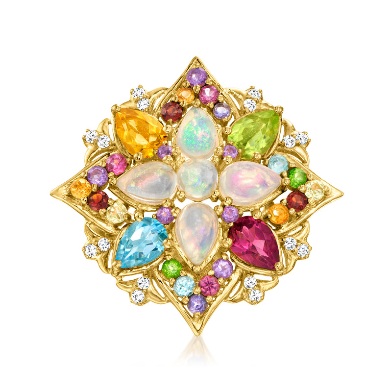 Multi-gemstone ring in gold tone with opal-like center stones and colorful side gems