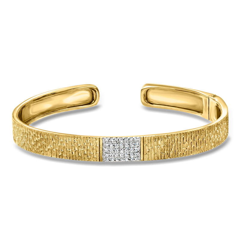 Gold cuff bracelet with textured band and pavé diamond center panel