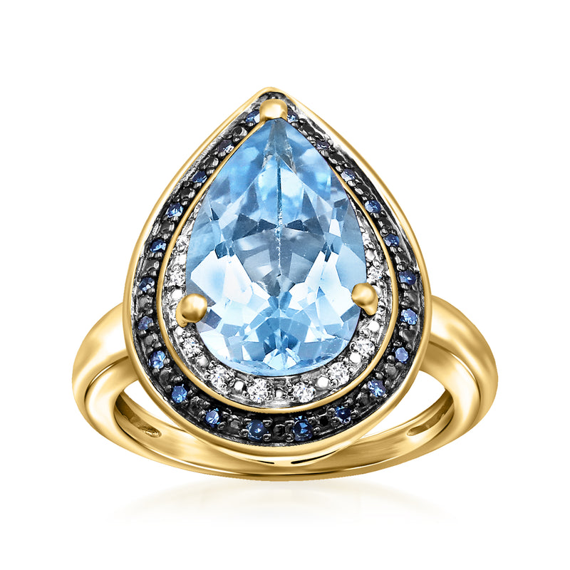 Sky-blue topaz pear-cut ring with diamond halo and gold band