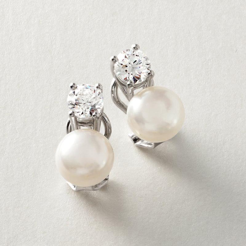 Sterling silver drop earrings with white pearl dangle and round CZ accents