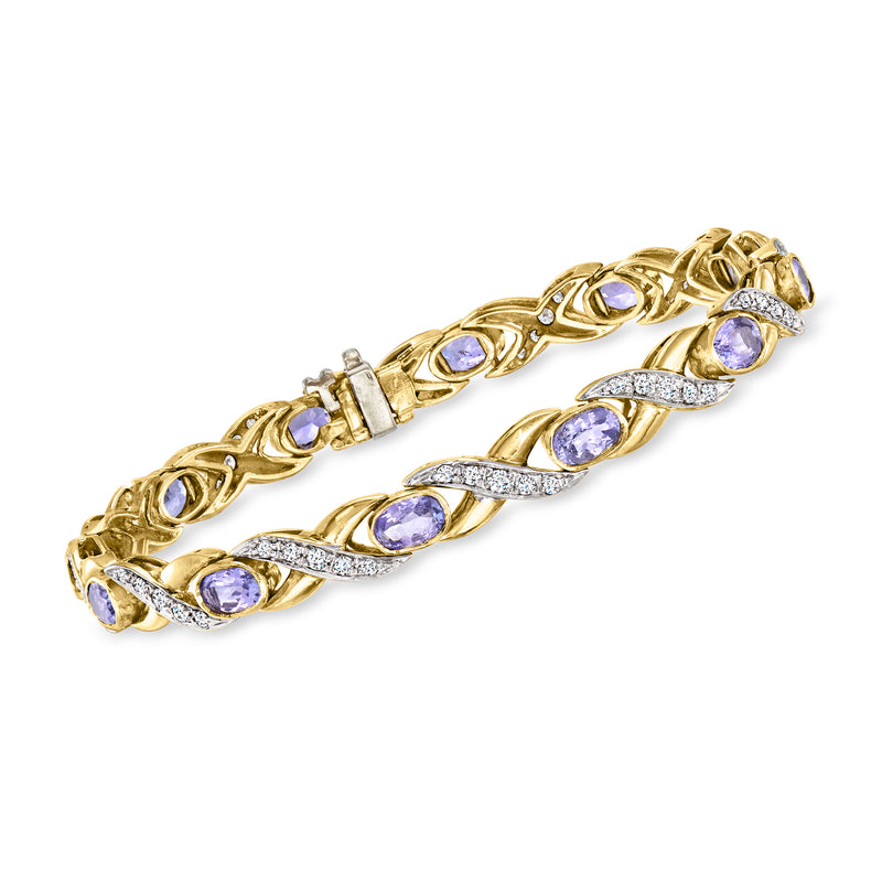 14kt yellow gold link bracelet with oval tanzanite gemstones and diamond accents