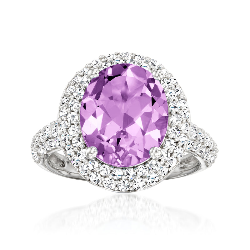 Sterling silver amethyst ring with round purple gemstone and white topaz halo