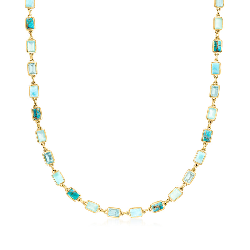 Gold-tone necklace with alternating square blue gemstone stations and bezel settings