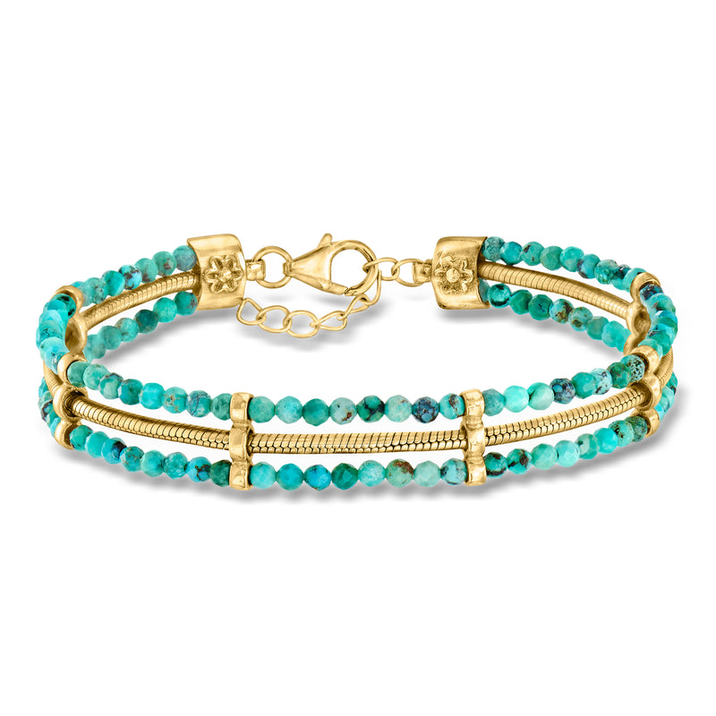 Turquoise beaded bracelet with gold bar accents and snake-chain clasp