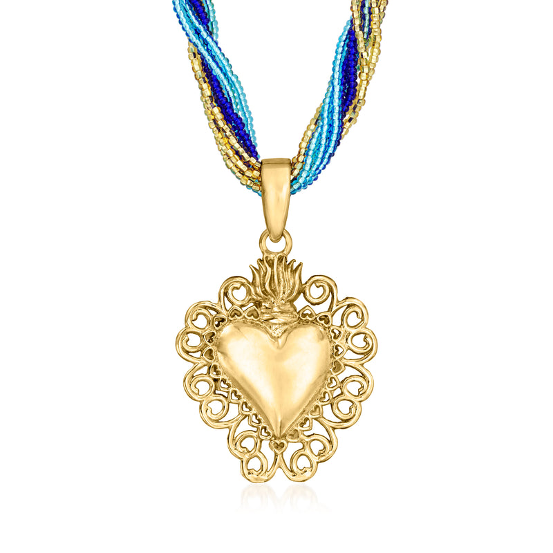 Gold heart pendant necklace with blue and gold multi-strand beads