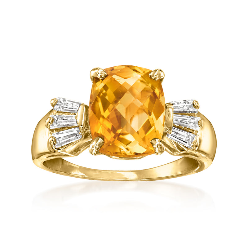 14kt yellow gold citrine ring with oval citrine center and baguette diamonds
