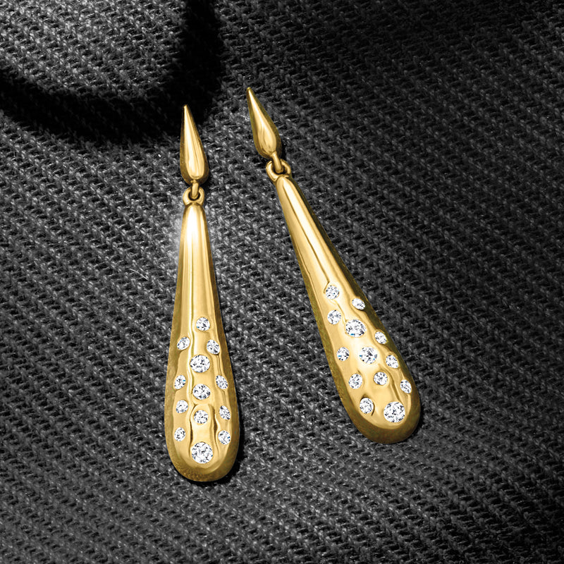 Teardrop yellow gold drop earrings with hanging round diamond cluster detailing