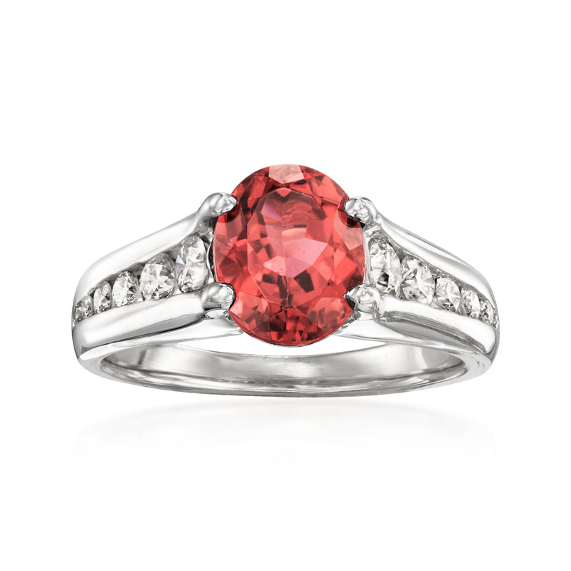 Platinum ring with oval pink tourmaline and diamond shoulders