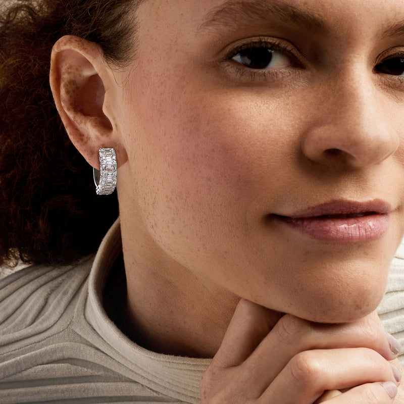 Baguette-cut diamond hoop earrings on model, 14kt white gold