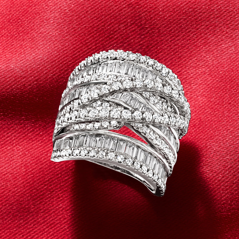 14kt white gold diamond highway ring with baguette and round stones on red fabric