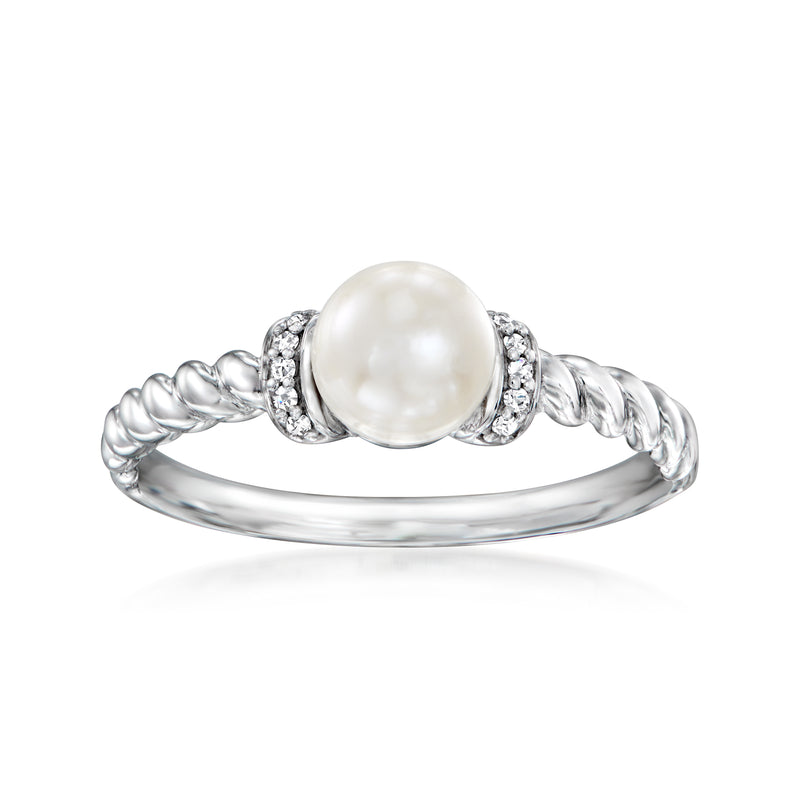 Sterling silver pearl ring with diamond-like halo and twisted band