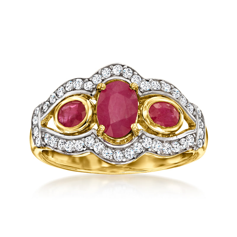 Ruby-red zircon ring with oval center, round pink stones, and white crystal halo
