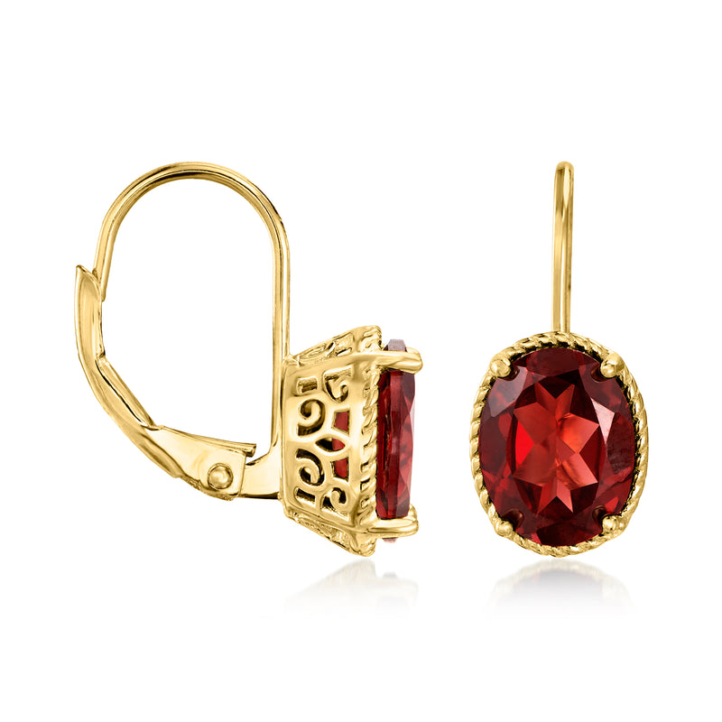 Gold-tone leverback drop earrings with red oval garnet and decorative gold frame