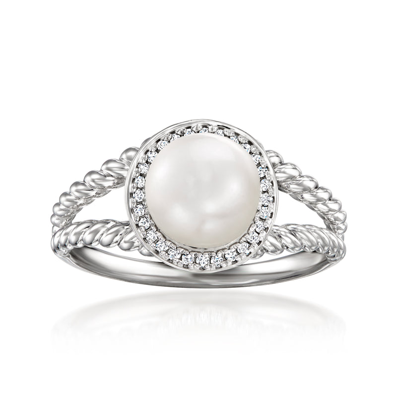 Sterling silver ring with round cultured pearl center and diamond halo accents