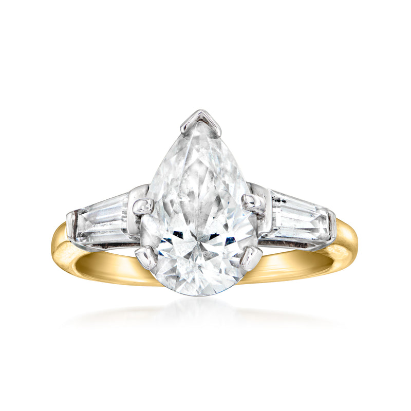 Oval CZ ring with yellow gold band, silver-toned prongs and baguette side stones