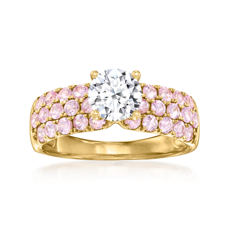 14kt yellow gold ring with oval center diamond and pink sapphire halo rows