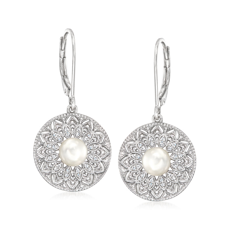 Sterling silver drop earrings with round cultured pearl center and diamond-like halo, leverback