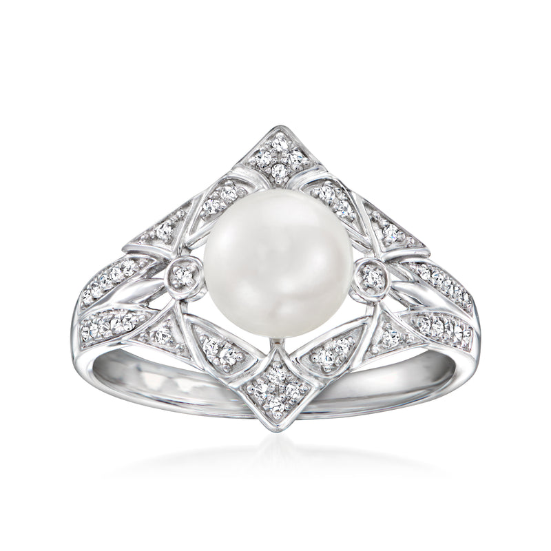 Sterling silver ring with round cultured pearl center and prong-set diamond accents