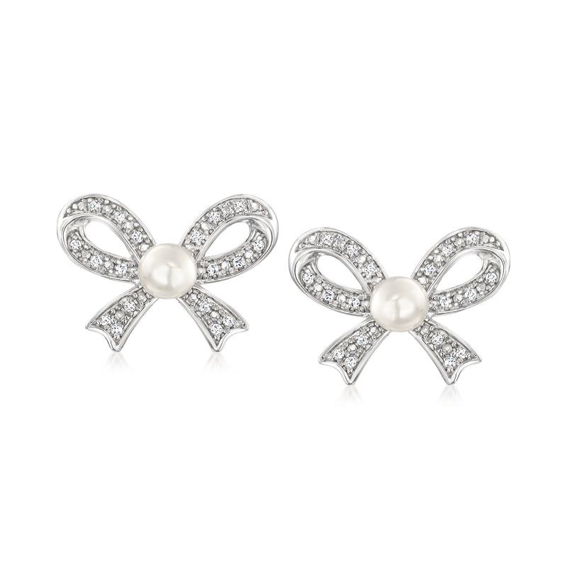 Pearl and diamond bow post earrings in sterling silver, pair