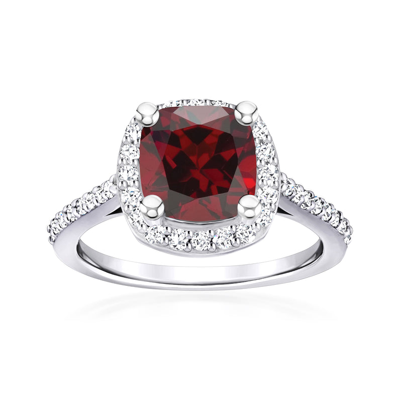 14kt white gold ring with cushion garnet center stone and diamond halo and side accents