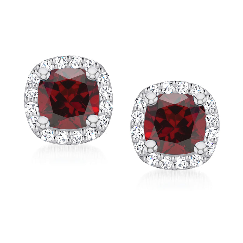 Garnet halo stud earrings in 14k white gold with round diamond accents