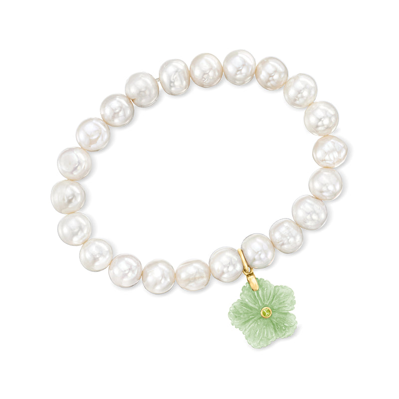Cultured pearl bracelet with gold flower charm and peridot accent