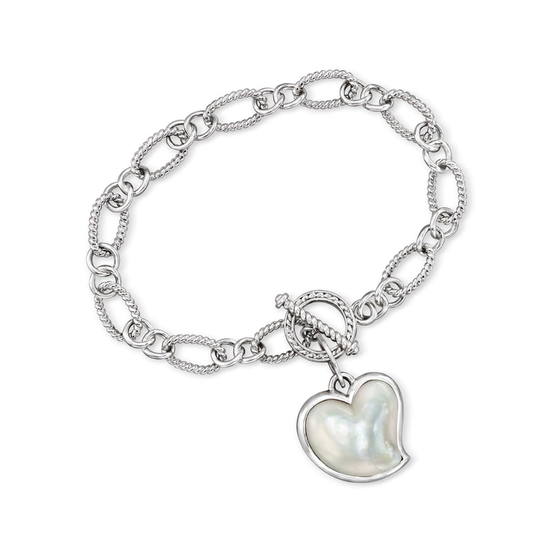 Sterling silver charm bracelet with iridescent mother-of-pearl heart pendant and clasp