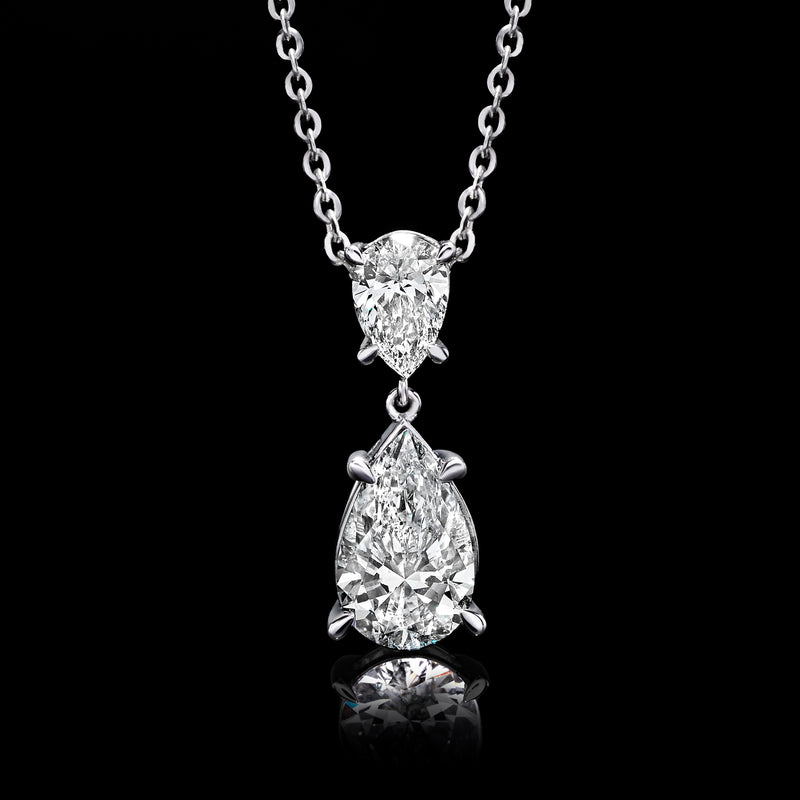 Pear-cut diamond pendant necklace in 14kt white gold with two linked teardrops