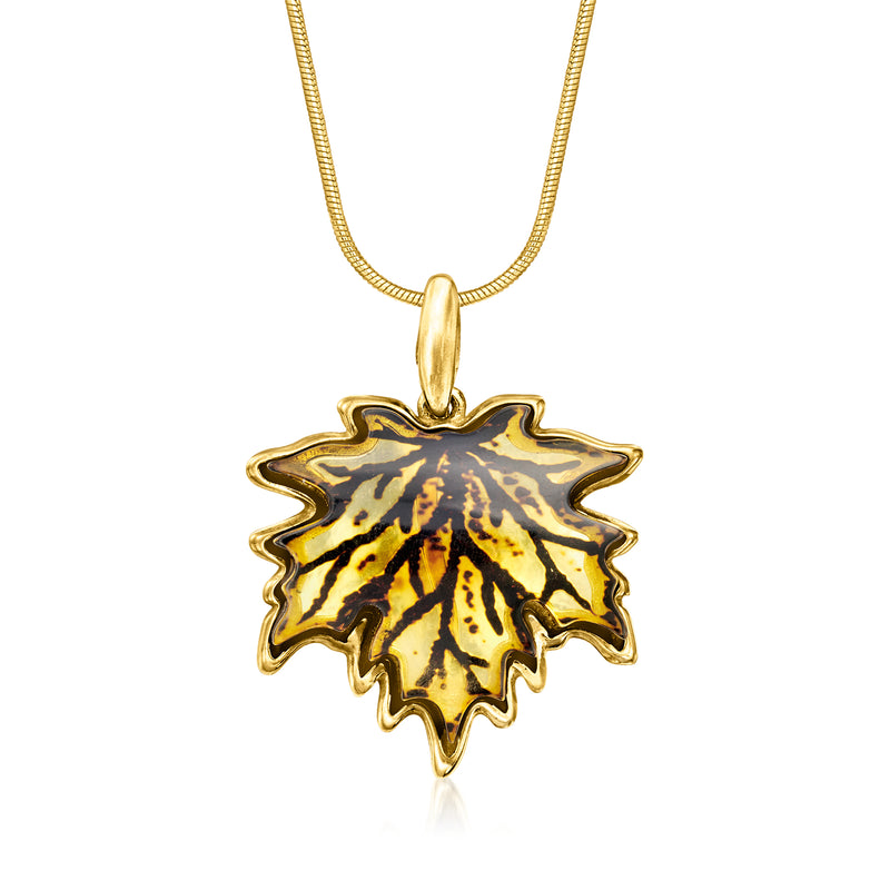 Amber leaf pendant necklace with amber-toned leaf charm in gold-tone setting