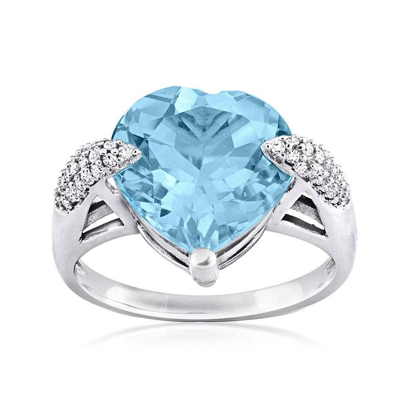 Heart-shaped sky blue topaz ring in 14kt white gold with diamond accents