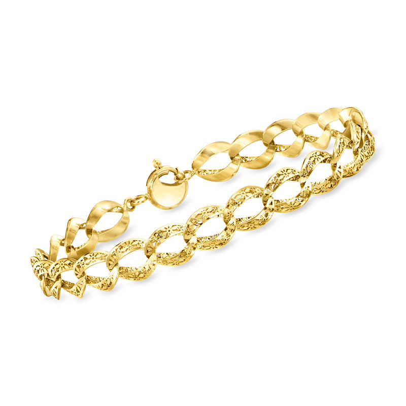 14kt yellow gold filigree curb-link bracelet, oval links with decorative end