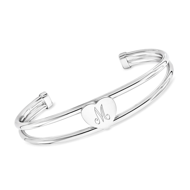 Sterling silver heart cuff bracelet with engraved initial on center heart