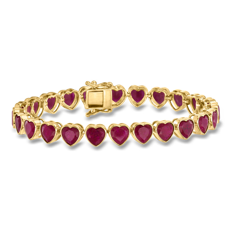Gold tennis bracelet with ruby heart stones and square center clasp